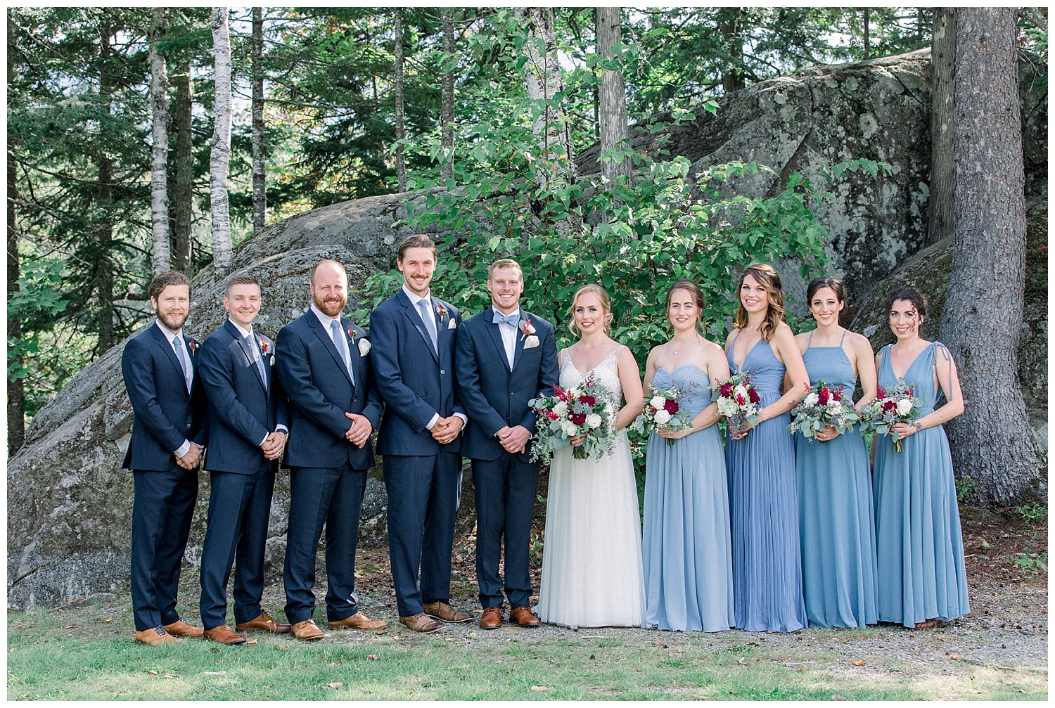 Bridal party at the Outdoor Adventure Center at a Sugarloaf Mountain Resort Wedding in Maine, photos by Halie Olszowy.