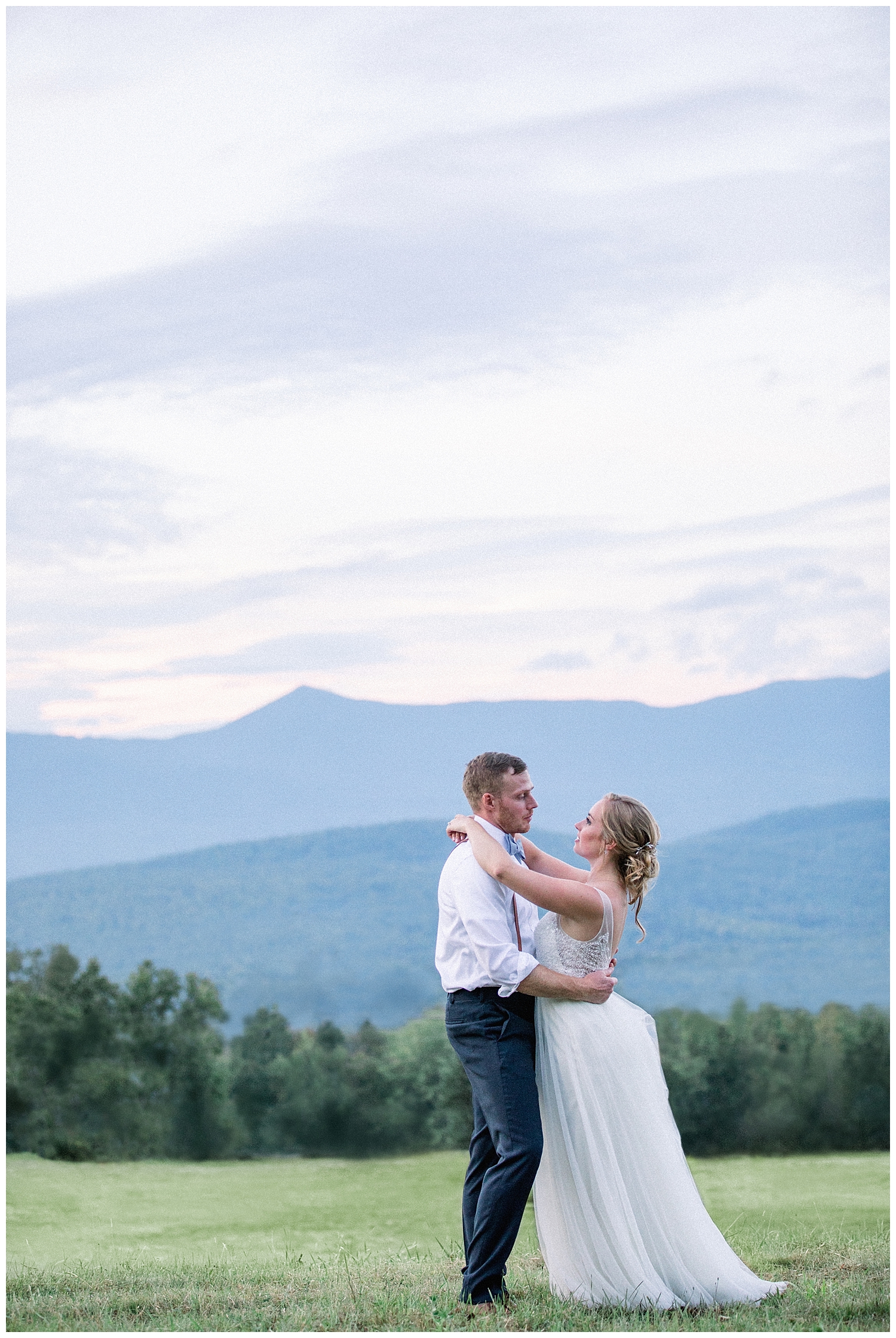 Sunset over Carrabassett Valley at a wedding. Sugarloaf Mountain Resort Wedding in Maine, photos by Halie Olszowy.