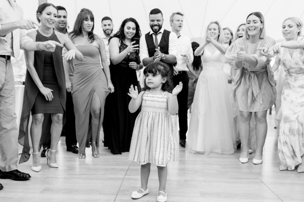 Wentworth by the Sea Country Club Rye NH wedding, flower girl and dancing in Sperry sailcloth tent