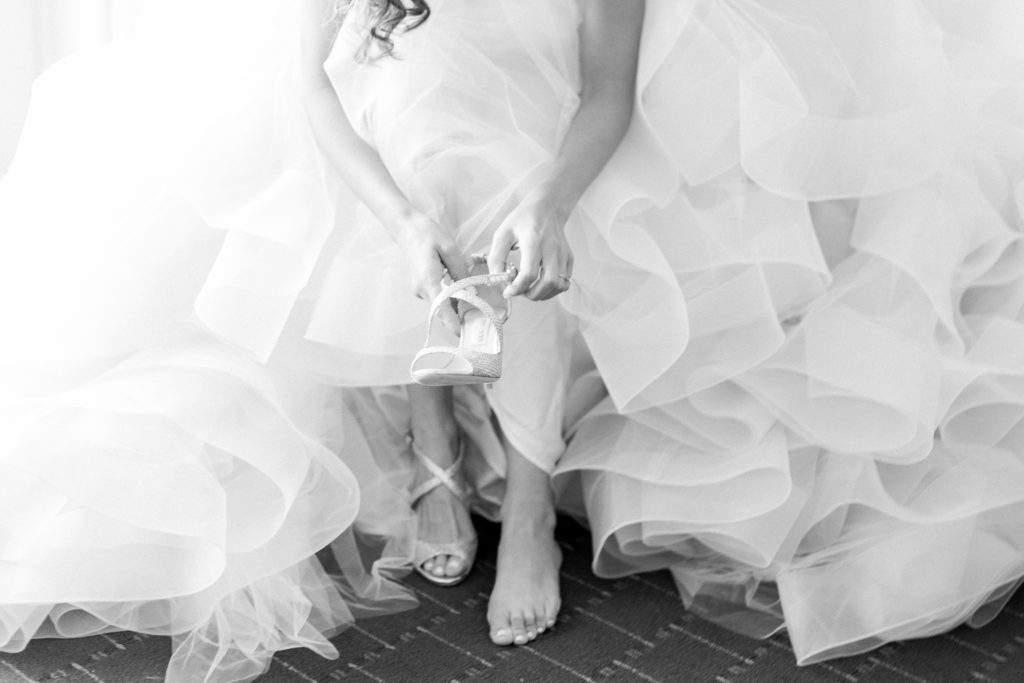 Jimmy Choo heels and Lazaro floral gown at Wentworth by the Sea Country Club NH wedding