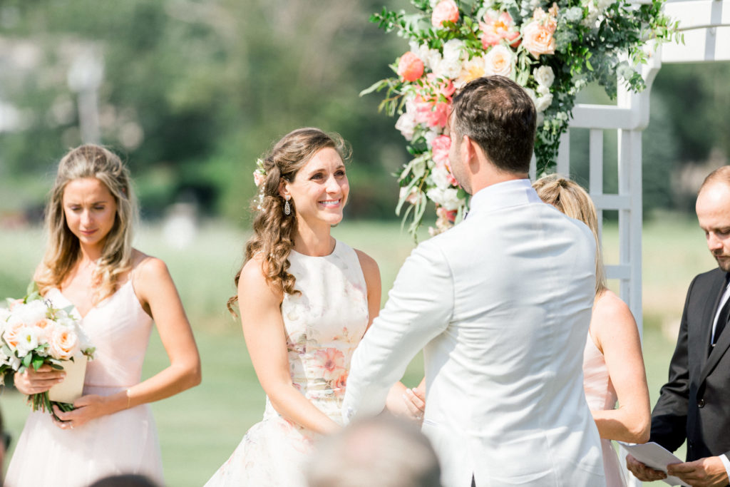 Wentworth by the Sea Country Club Rye NH wedding, florals by Jardiniere, Lazaro floral bride's gown, Verstolo earrings