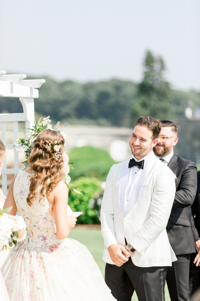 Wentworth by the Sea Country Club Rye NH wedding, florals by Jardiniere, Lazaro floral bride's gown, Indochino groom's white tux
