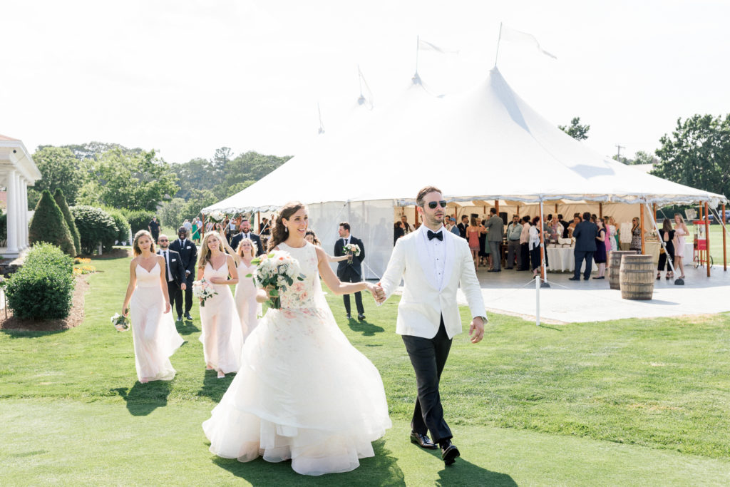 Wentworth by the Sea Country Club Rye NH wedding, Lazaro floral gown, Indochino white tux, cocktail hour Sperry sailcloth tent