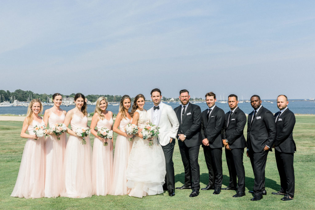 Wentworth by the Sea Country Club Rye NH wedding, Lazaro floral gown, Indochino white tux, wedding party by the ocean