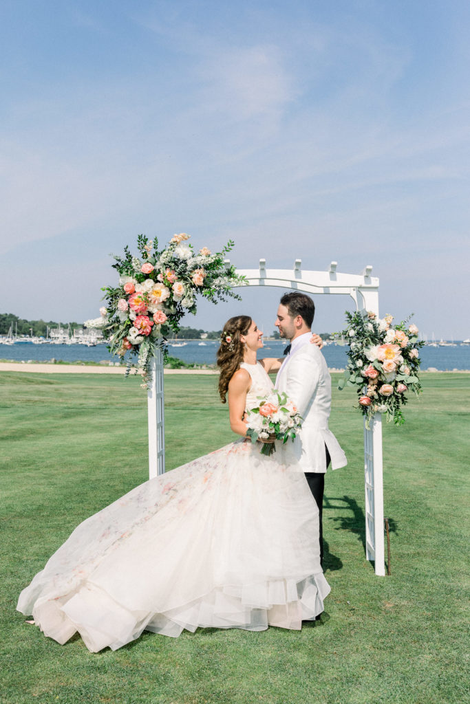 Wentworth by the Sea Country Club Rye NH wedding, Lazaro floral gown, Indochino white tux, florals by Jardiniere Flowers