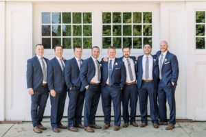 Navy groomsmen suits from Jos. A. Bank, Coastal NH wedding at Abenaqui Country Club and Fuller Gardens in Rye