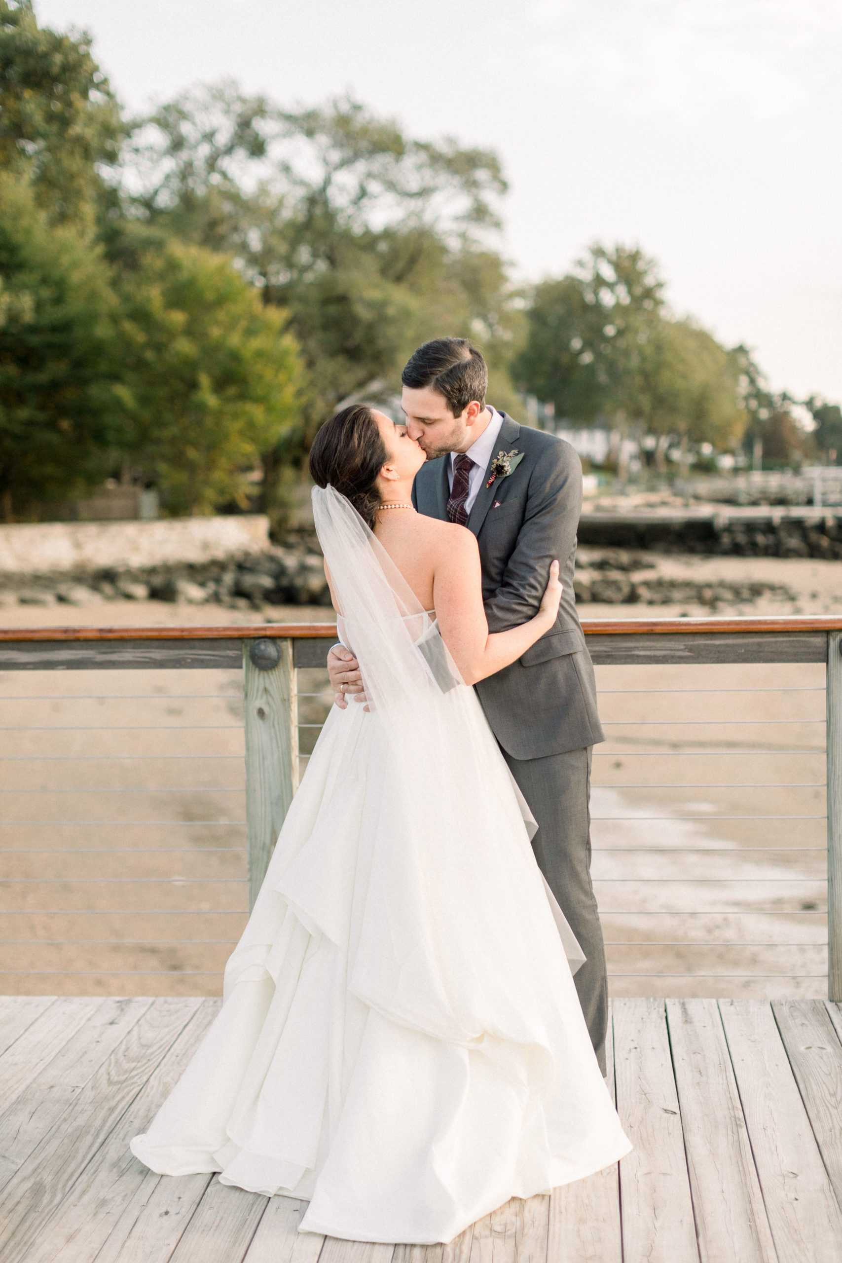 Stamford Yacht Club Wedding - CT wedding sunset photos with classic BLHDN strapless dress