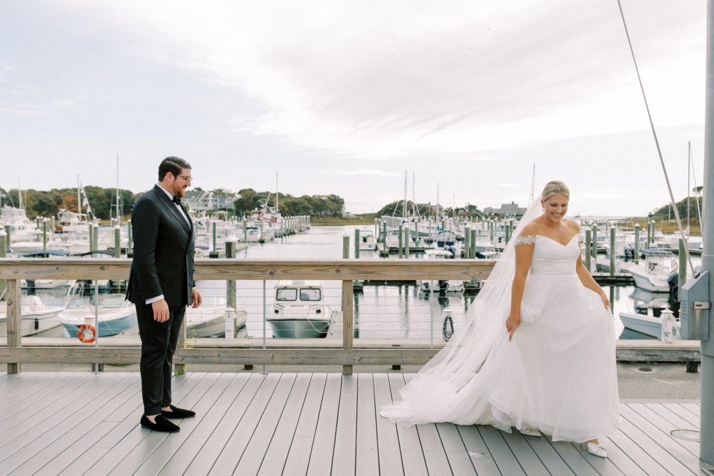 Bride and groom first look at Saquatucket Harbor
