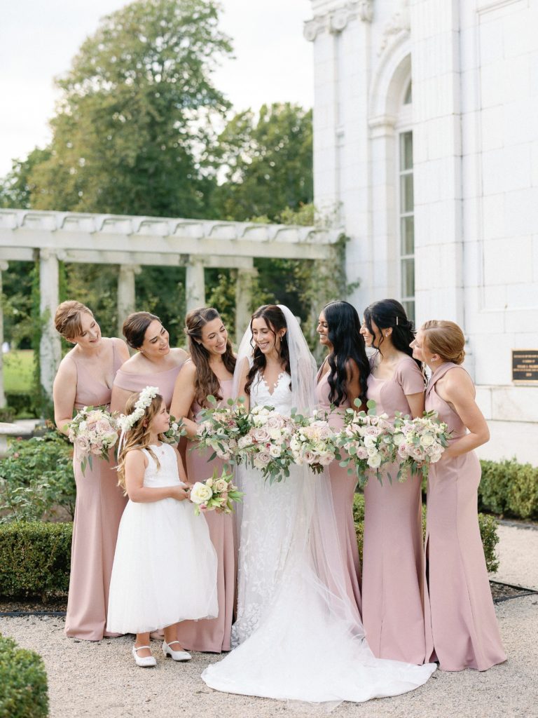Bride and bridesmaids portrait in pink bridesmaids dresses for Rosecliff Wedding 