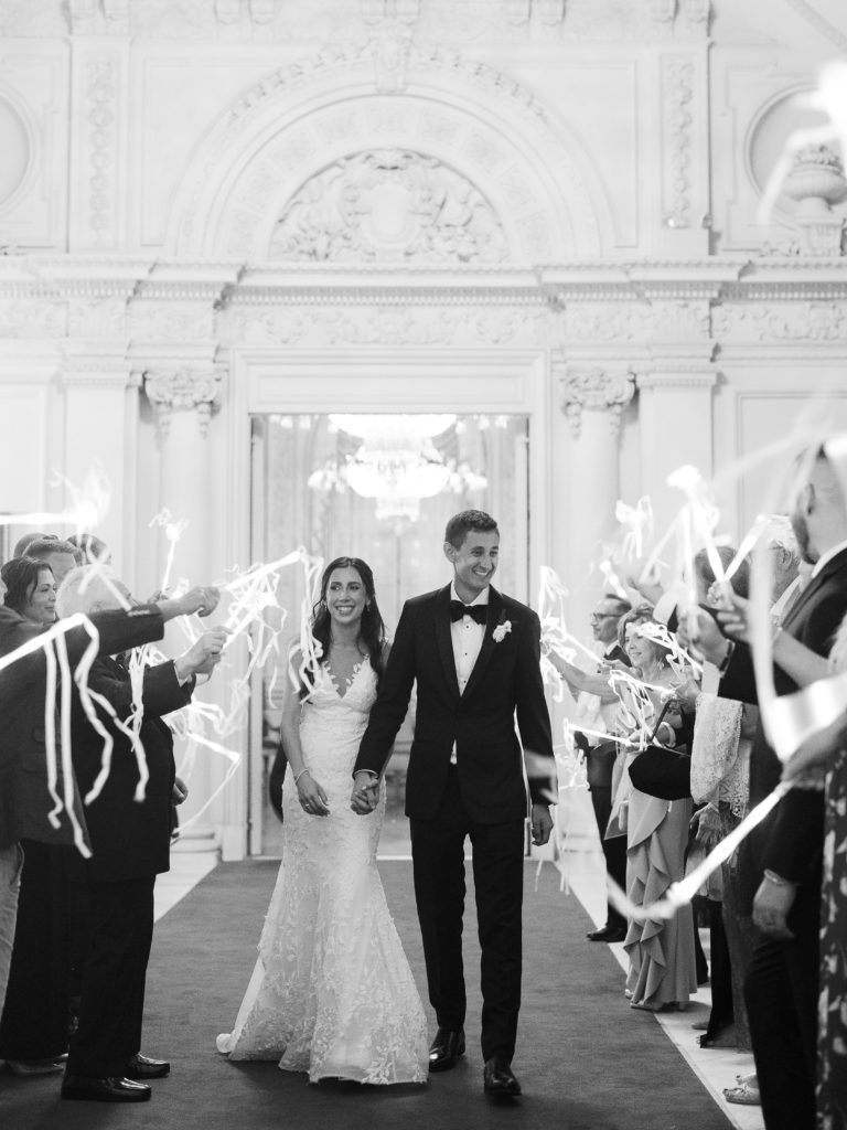 Bride and groom streamer exit at Rosecliff Newport Mansion 