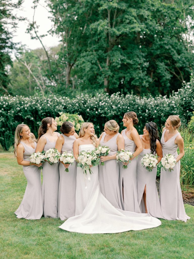 Bride and bridesmaid dresses for summer wedding with light and neutral bridesmaid dresses