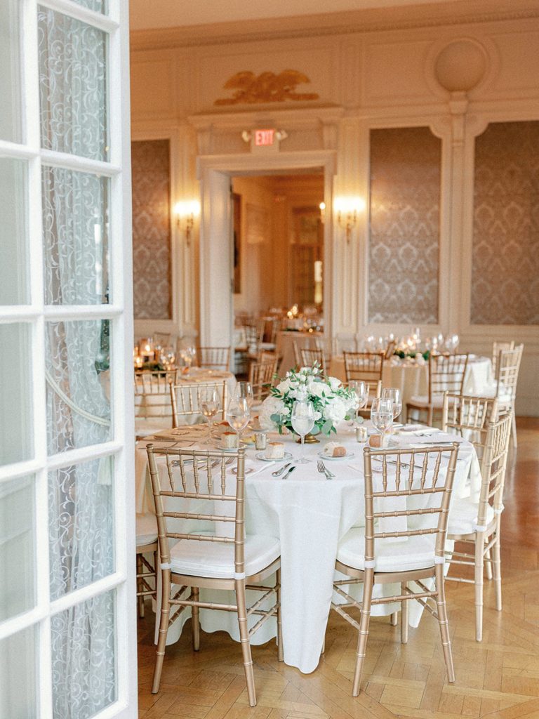 Reception table decor at Glen Manor House with gold chivari chairs