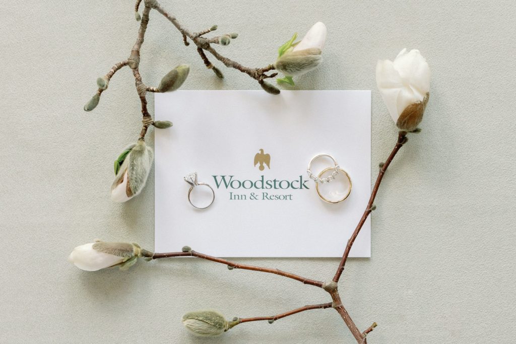 Woodstock Inn & Resort Flatlay with wedding rings