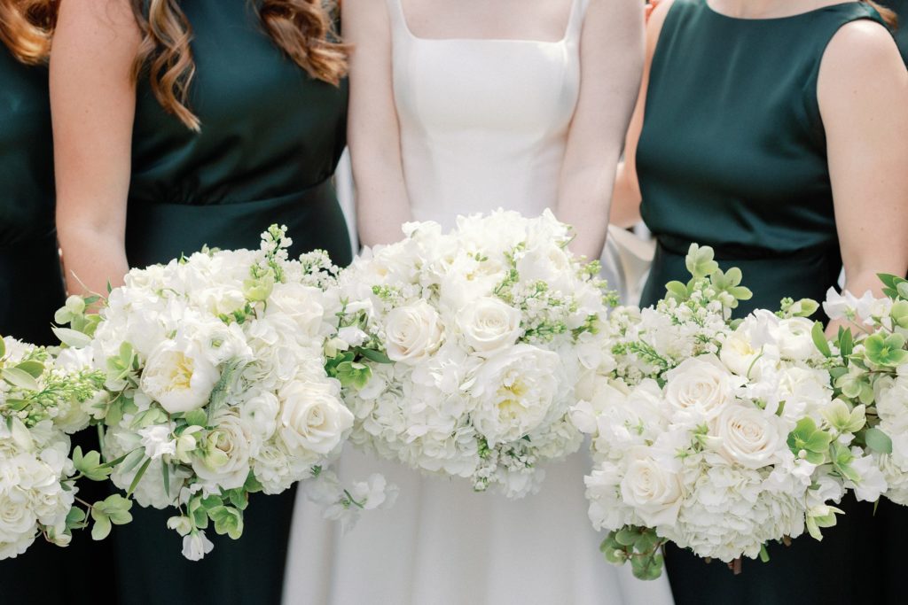Bride and bridesmaid all white bouquets for spring Vermont wedding