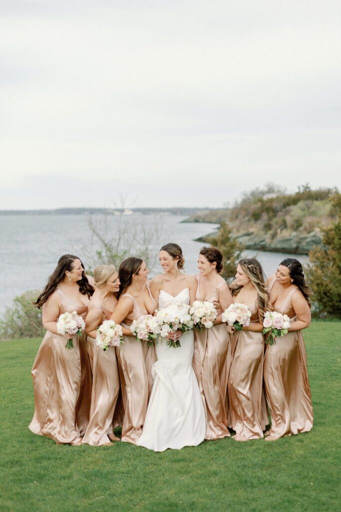 Bride and bridesmaids with gold bridesmaid dresses 
