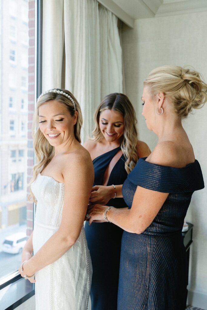 Bride and bridesmaids getting ready photo at the Four Seasons in Boston 