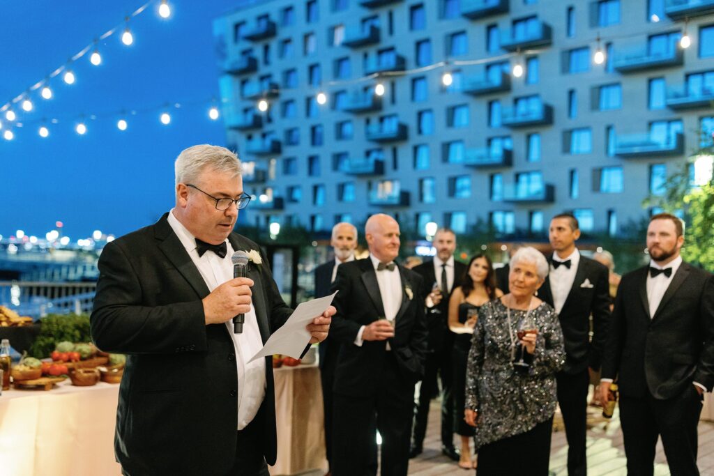Bride's father giving a speech at ICA