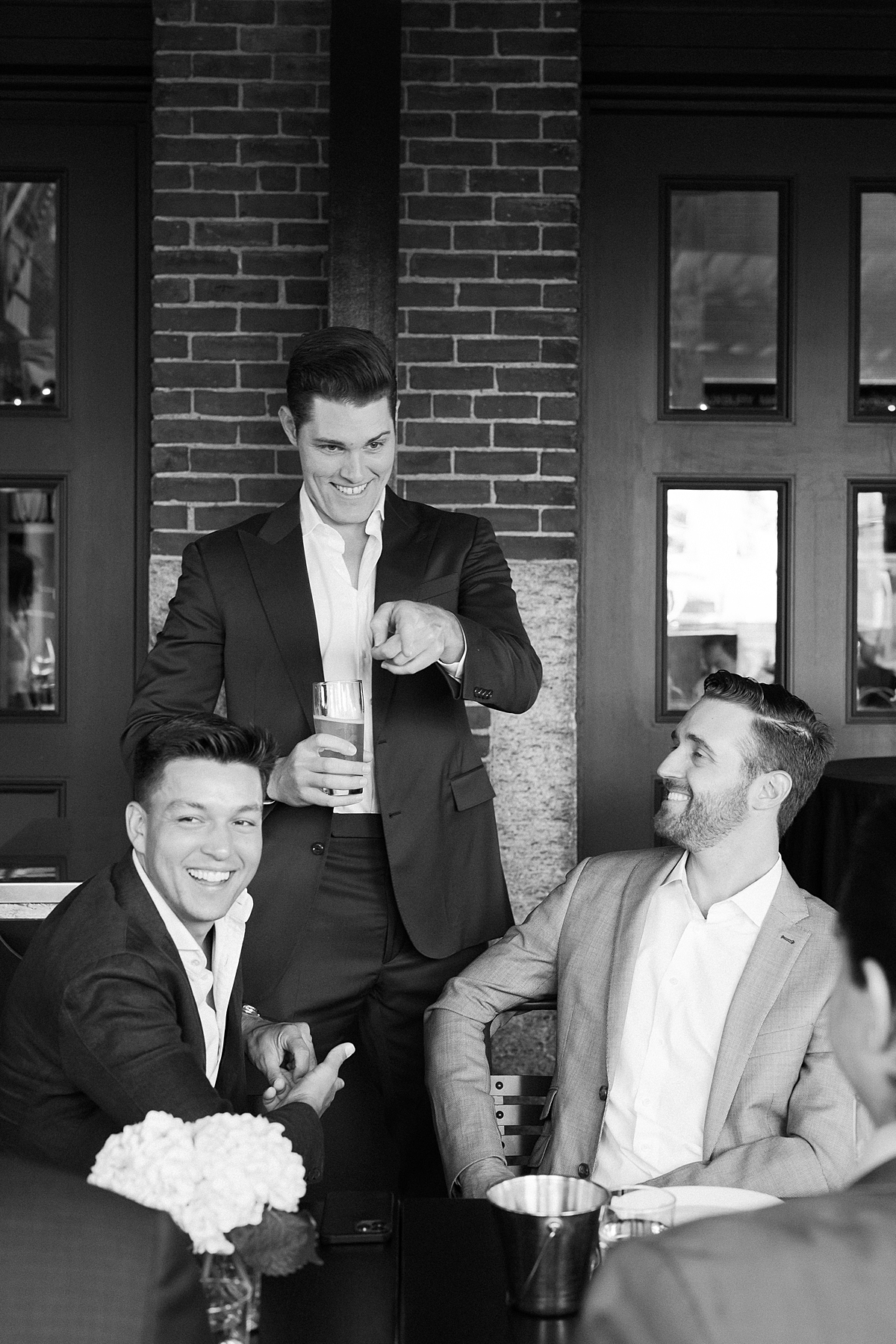 Groom and his friends at his rehearsal dinner at Row 34