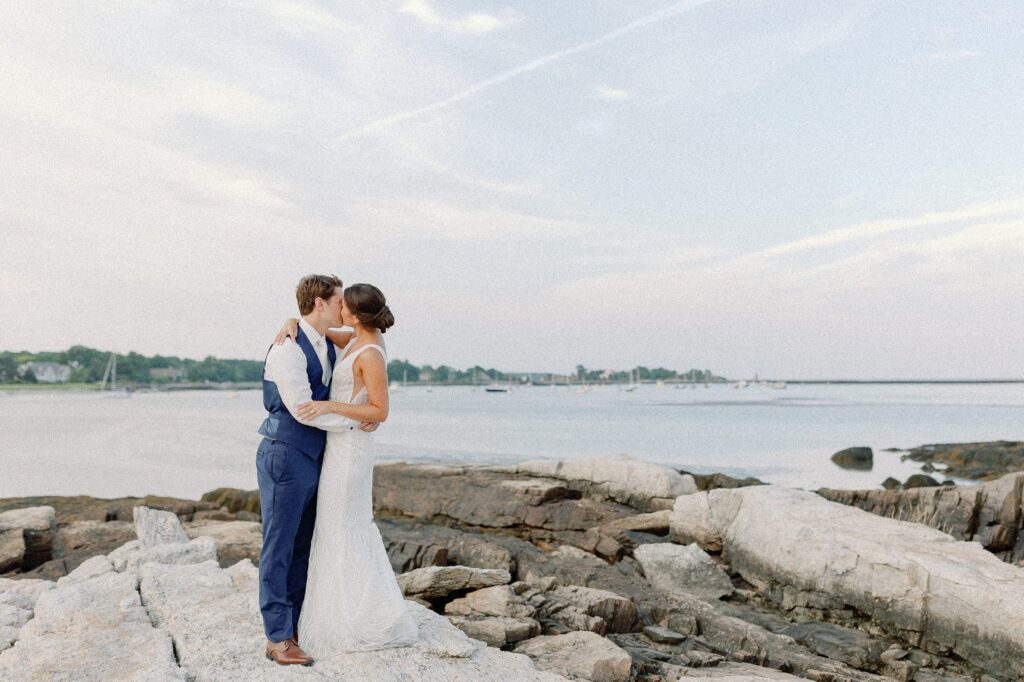Coastal New England Tented Wedding bride and groom portraits along the ocean