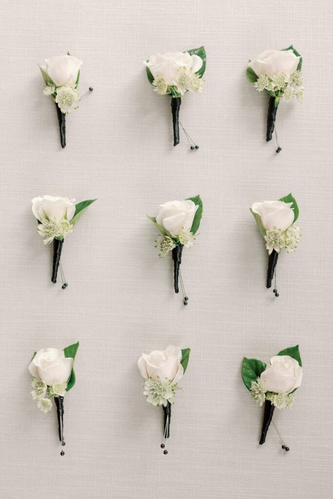 Newport Mansion flat-lay of boutonieers of wedding detail photography