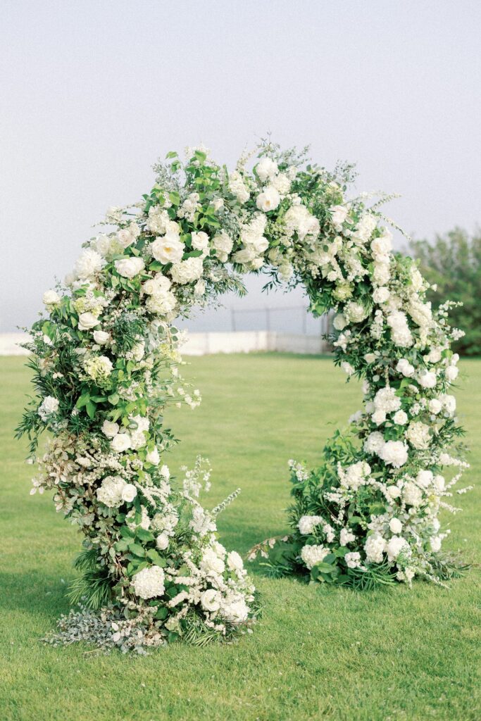 Circular flower design for Newport Mansion ceremony with white flowers