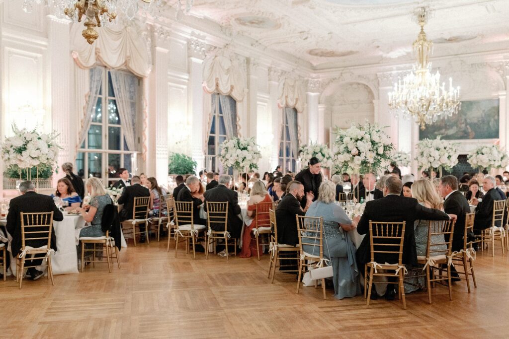 Guests seated at Rosecliff Newport Mansion wedding reception 