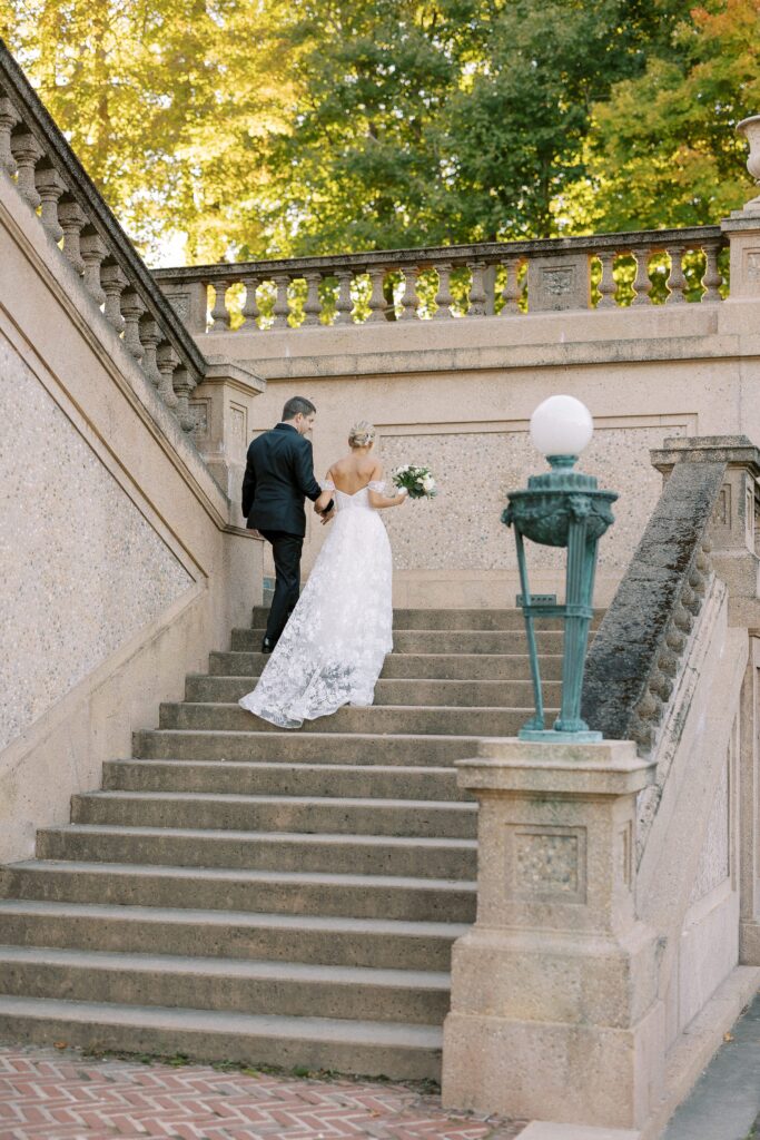 Bride and groom portrait on the steps of Crane Estate in Ipswich 