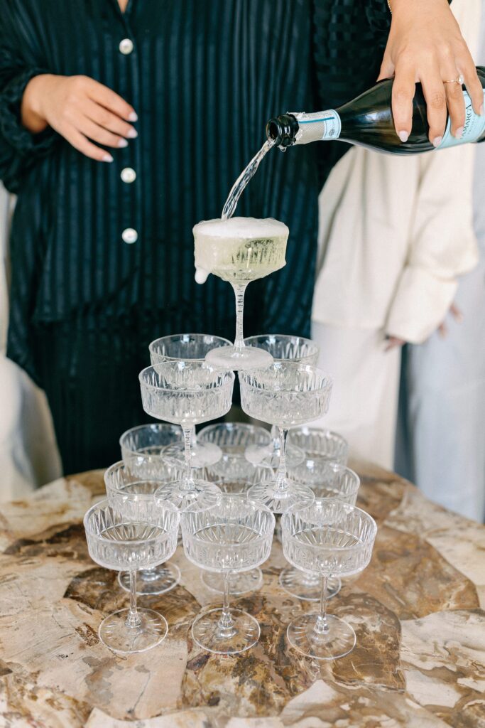 Mini champagne tower for bridesmaids while getting ready. 