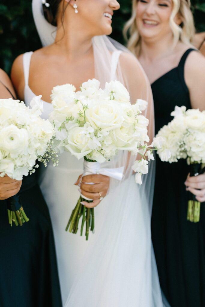 All white bride and bridesmaid bouquet for trendy and modern Newport wedding