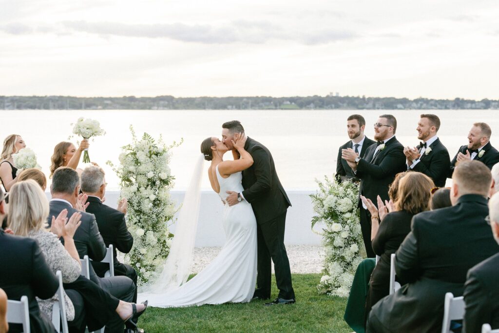 Bride and groom first kiss during Belle Mer wedding ceremony