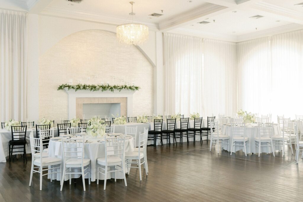 Reception space for Belle Mer wedding in Newport, RI with head table 