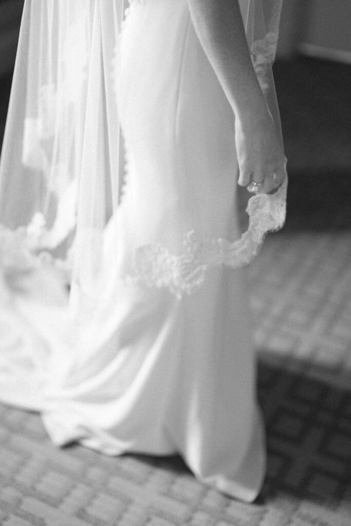 Black and white blurry detail photo of bride getting ready for Boston Public Library Wedding