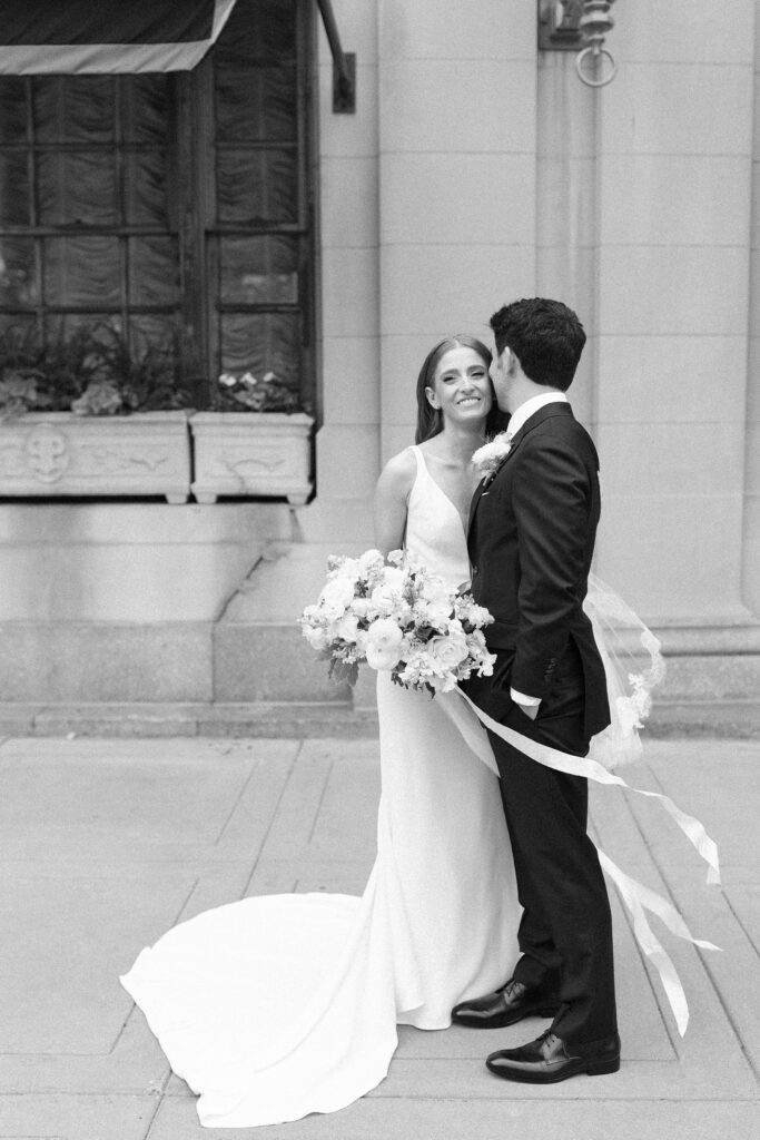 Black and white bride and groom portraits outside of the Fairmont Copley Plaza