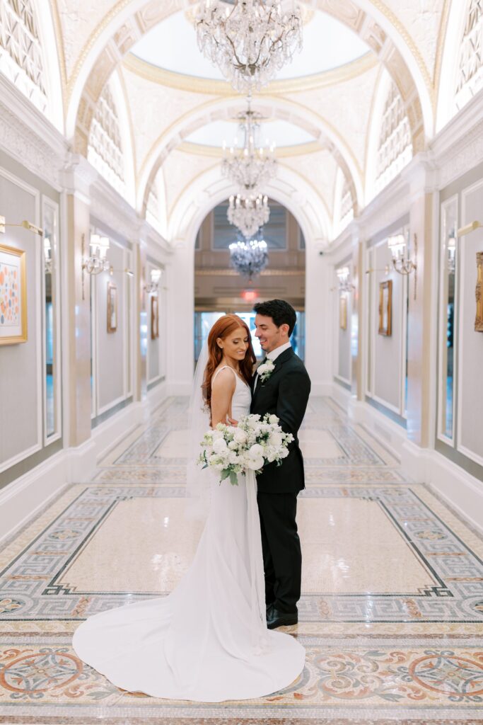 Bride and groom portraits inside of the Fairmont Copley Plaza hallway