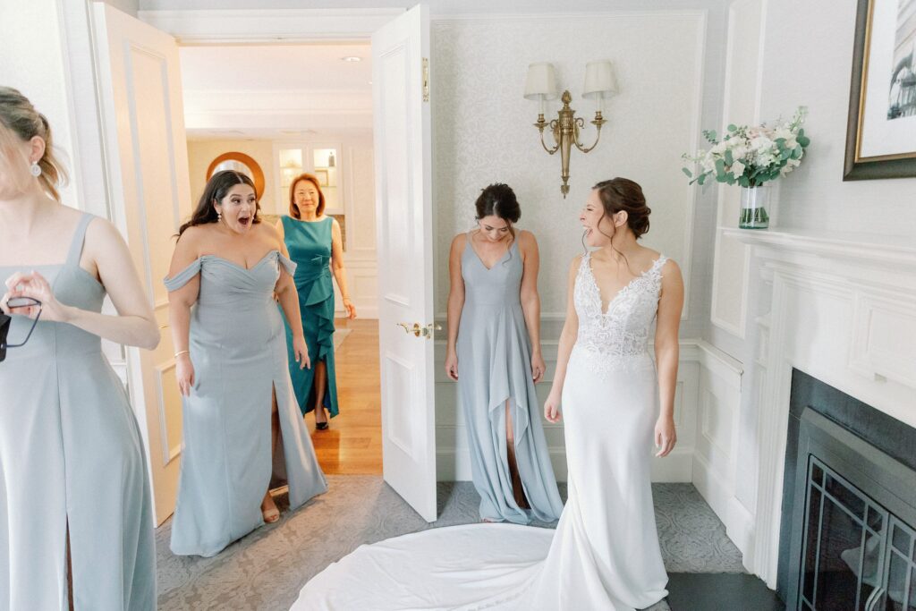 Bridesmaid reaction to seeing bride in dress for the first time 