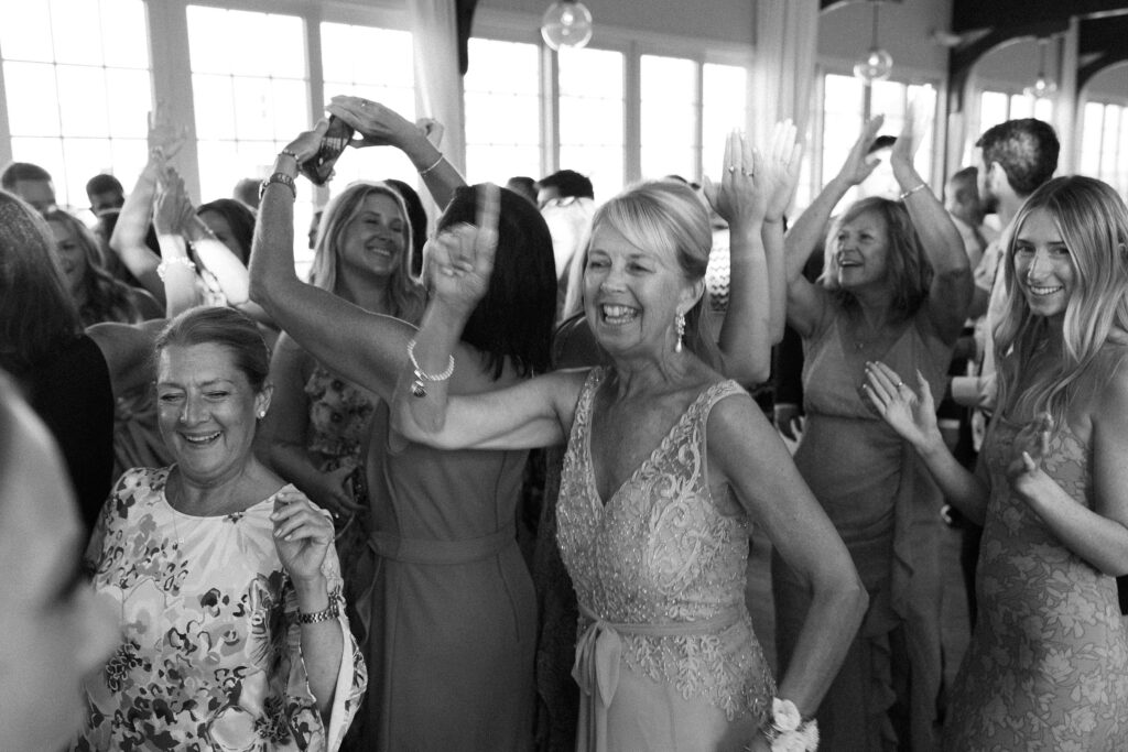 wedding guests dancing at the Wychmere Beach Club summer wedding on Cape Cod