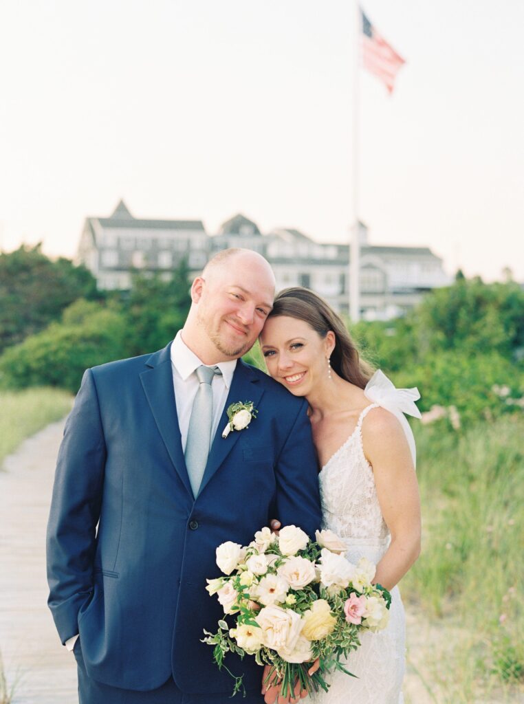 Sunset portraits at the Wychmere Beach Club during summer wedding on Cape Cod