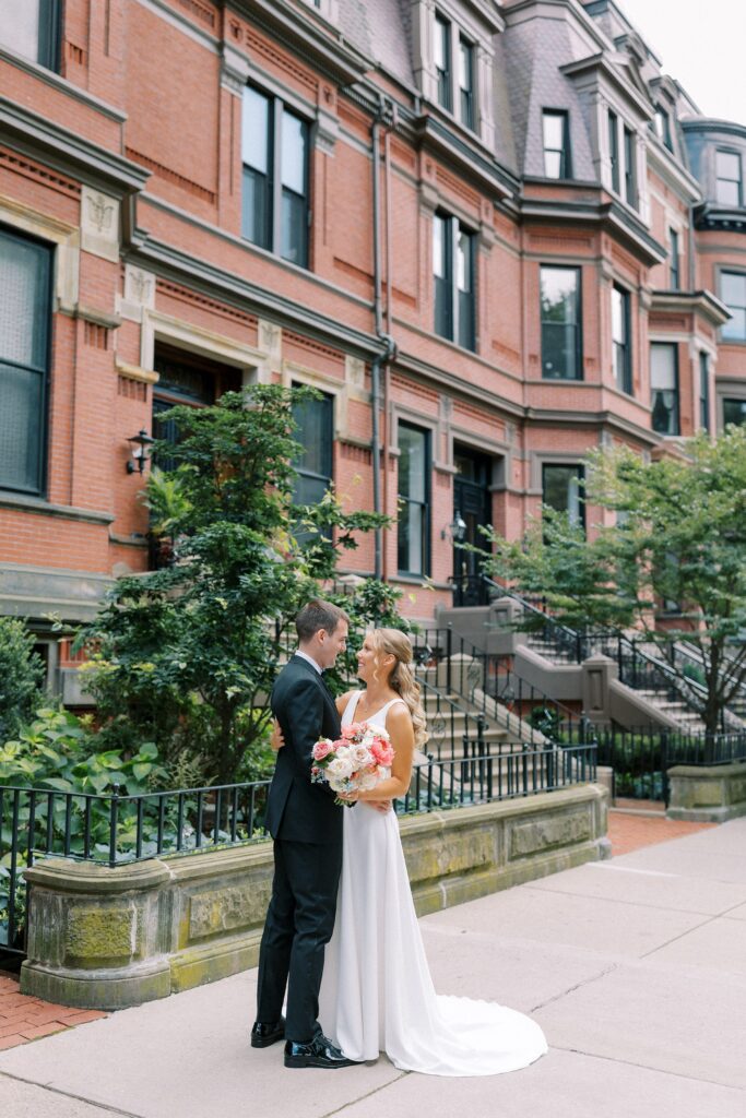 Bride and groom first look portrait outside before Back Bay wedding
