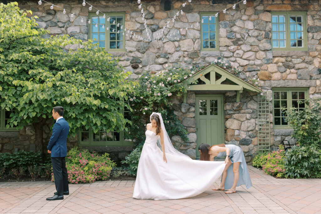 Bride and groom first look in courtyard at Willowdale Estate
