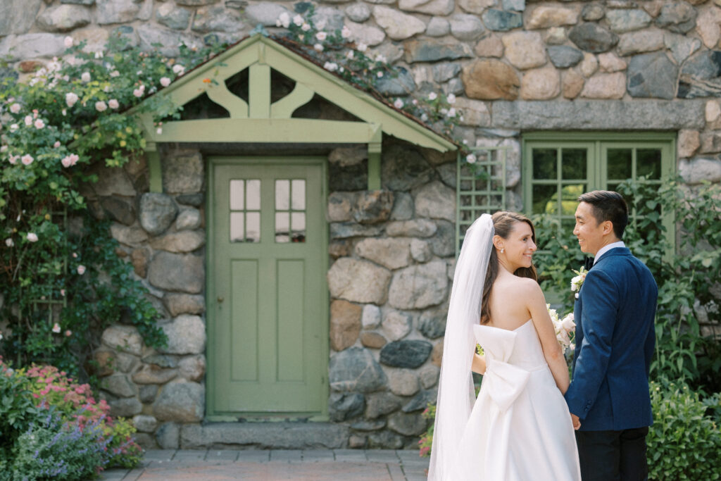 Bride and groom portrait before ceremony at Willowdale Estate courtyard