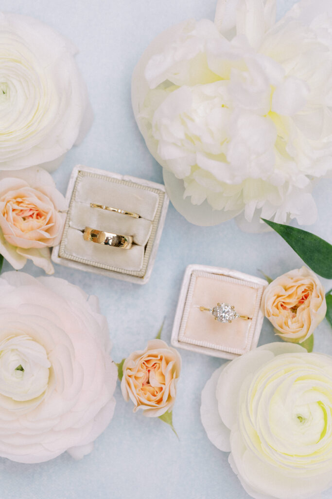 Wedding bands and engagement ring with roses detail photo for summer wedding at Willowdale Estate