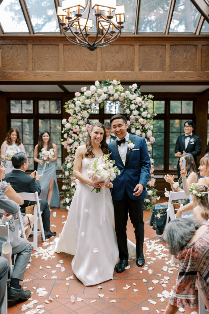 Bride and groom portrait during indoor ceremony at Willowdale Estate