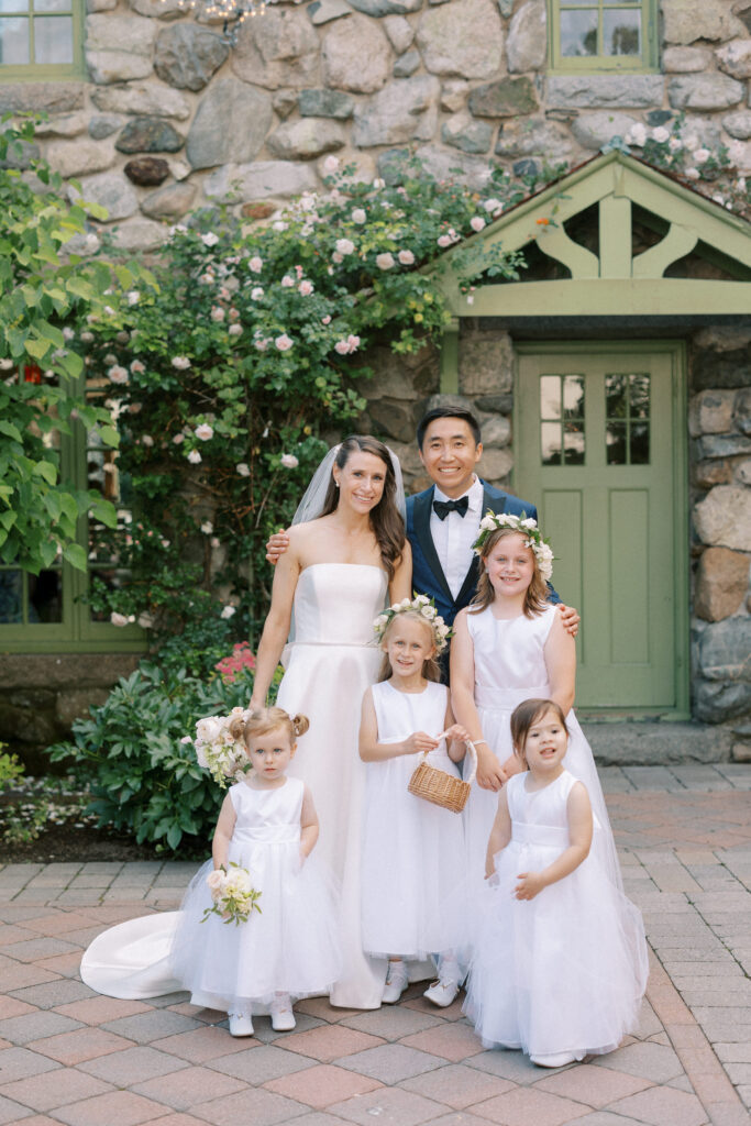Bride and groom photo with flower girls for summer wedding at Willowdale Estate