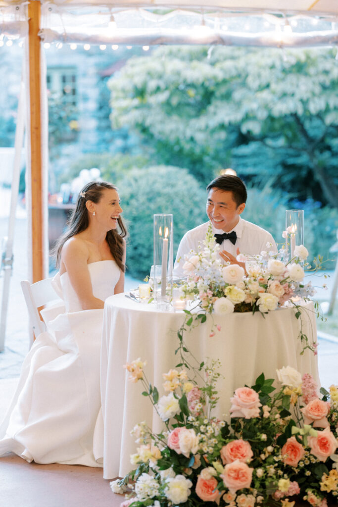 Bride and groom laughing during wedding reception at Willowdale Estate