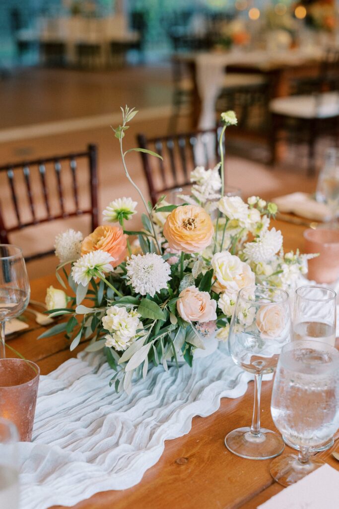 Floral arrangements for outdoor tented wedding reception | Boston North Shore wedding at Willowdale Estate