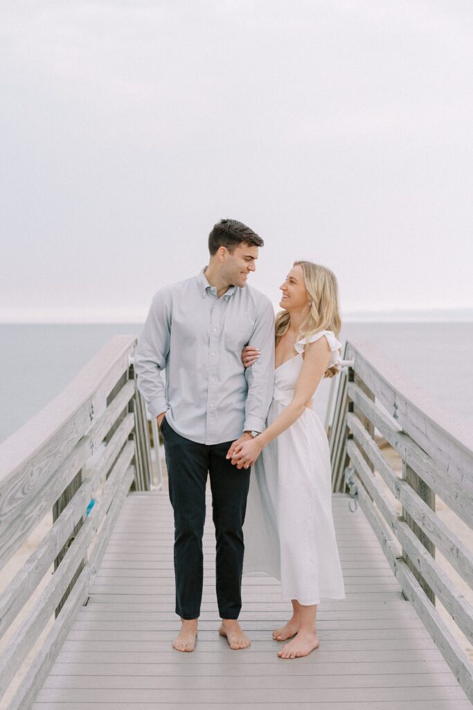 Beach Engagement Photography in Sandwich, MA on the boardwalk