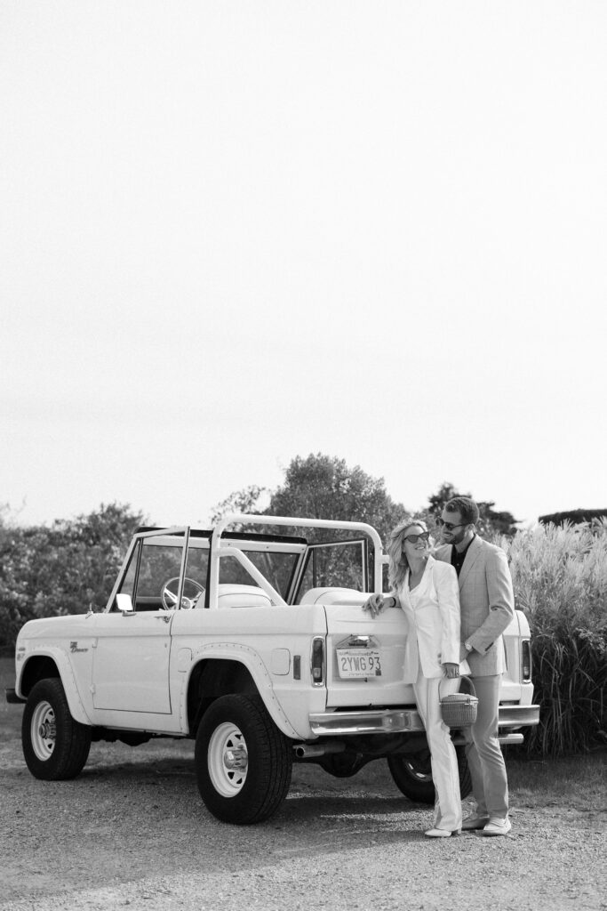 Black and white couple portraits with a blue bronco on Martha's Vineyard