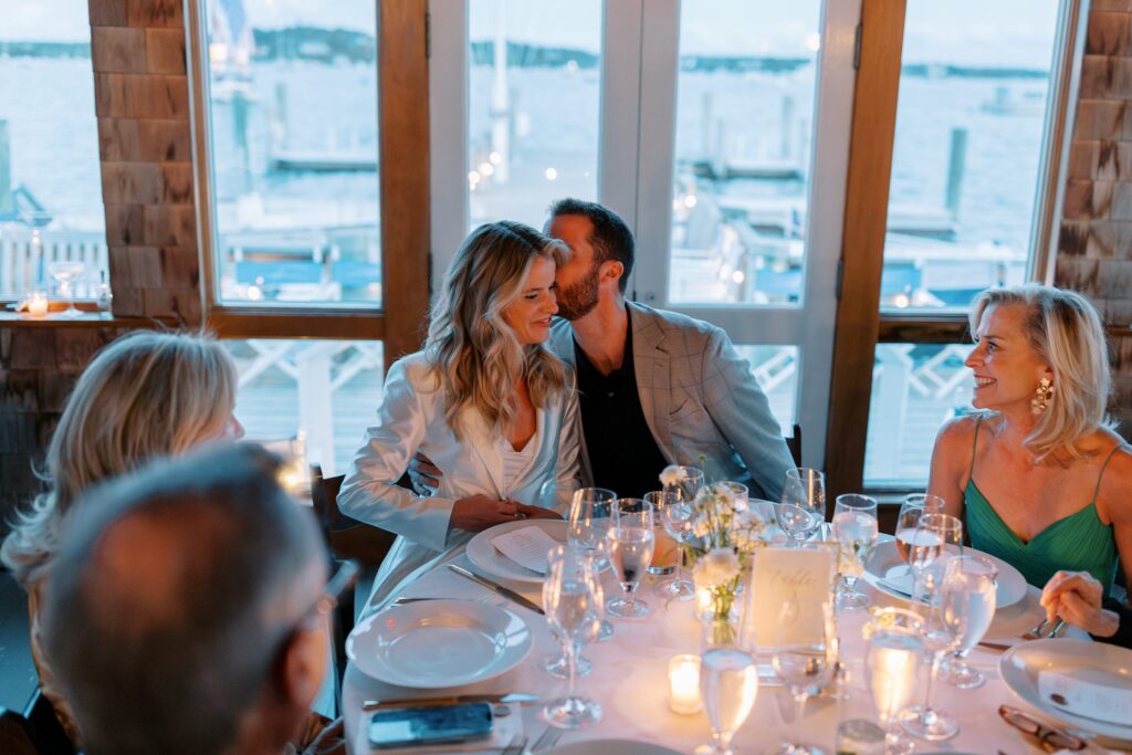 Candid photography of bride and groom at rehearsal dinner at the Edgartown Reading Room