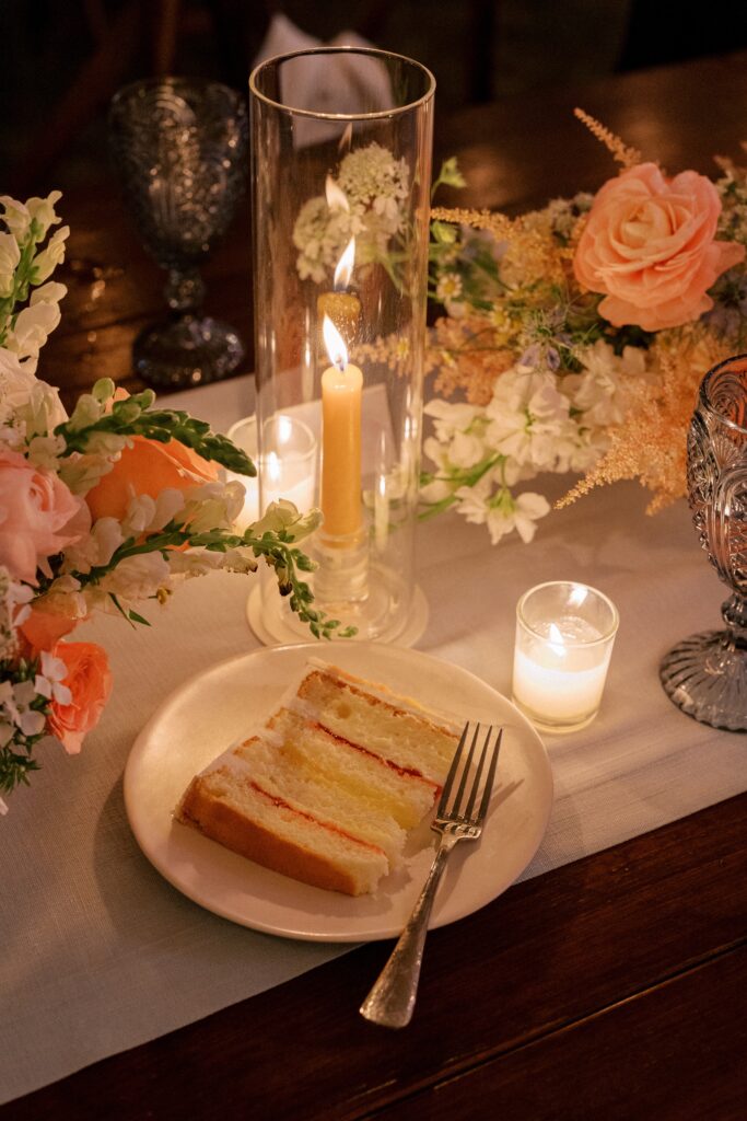 Piece of cake on table at wedding reception for Martha's Vineyard tented wedding