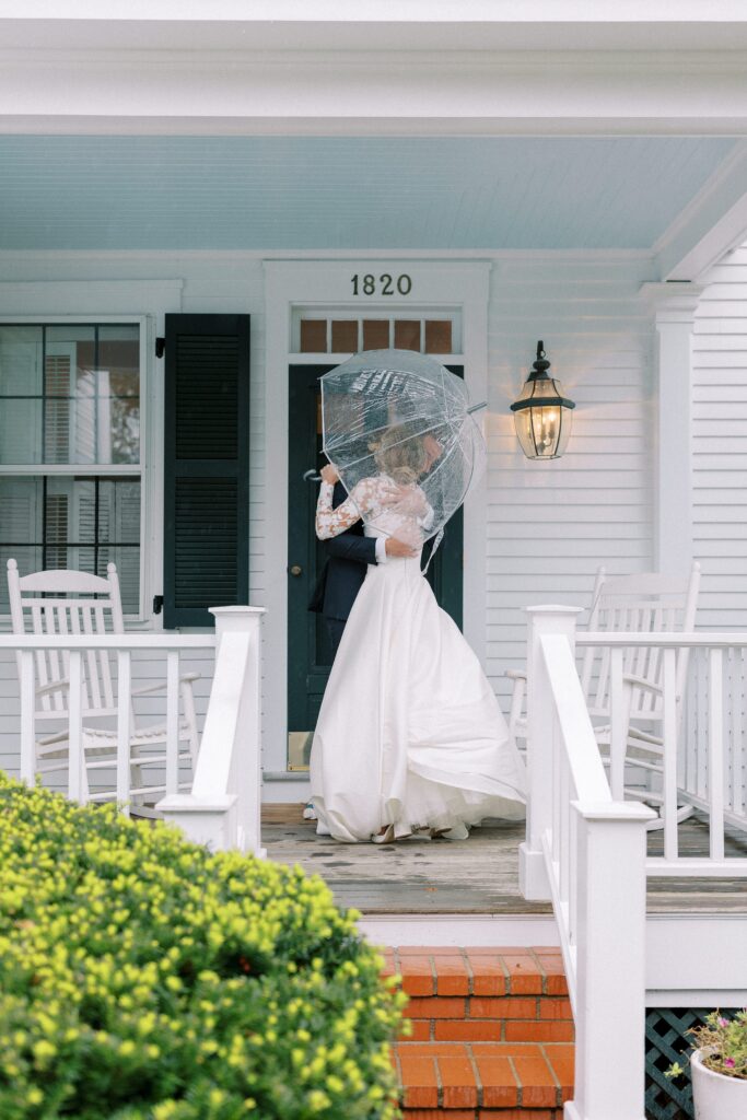 Rainy first look on the porch of a Martha's Vineyard home
